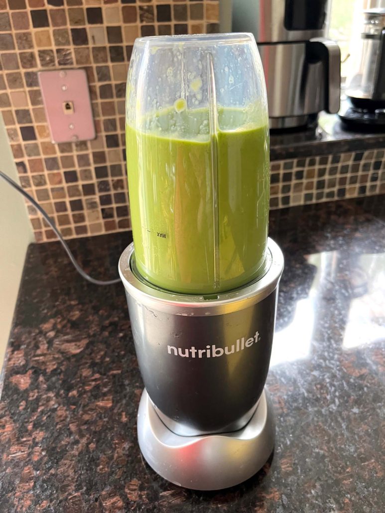 Mango Spinach Smoothie being blended