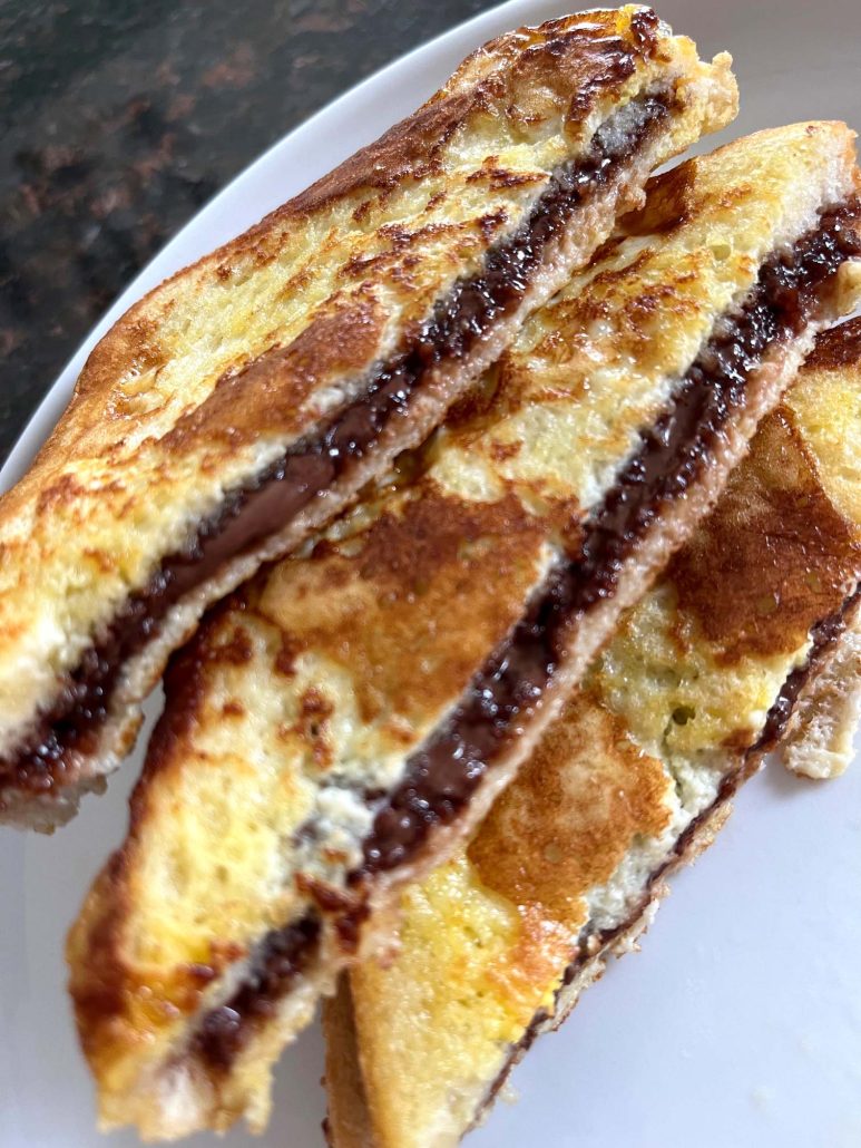 pieces of Nutella Stuffed French Toast on a plate