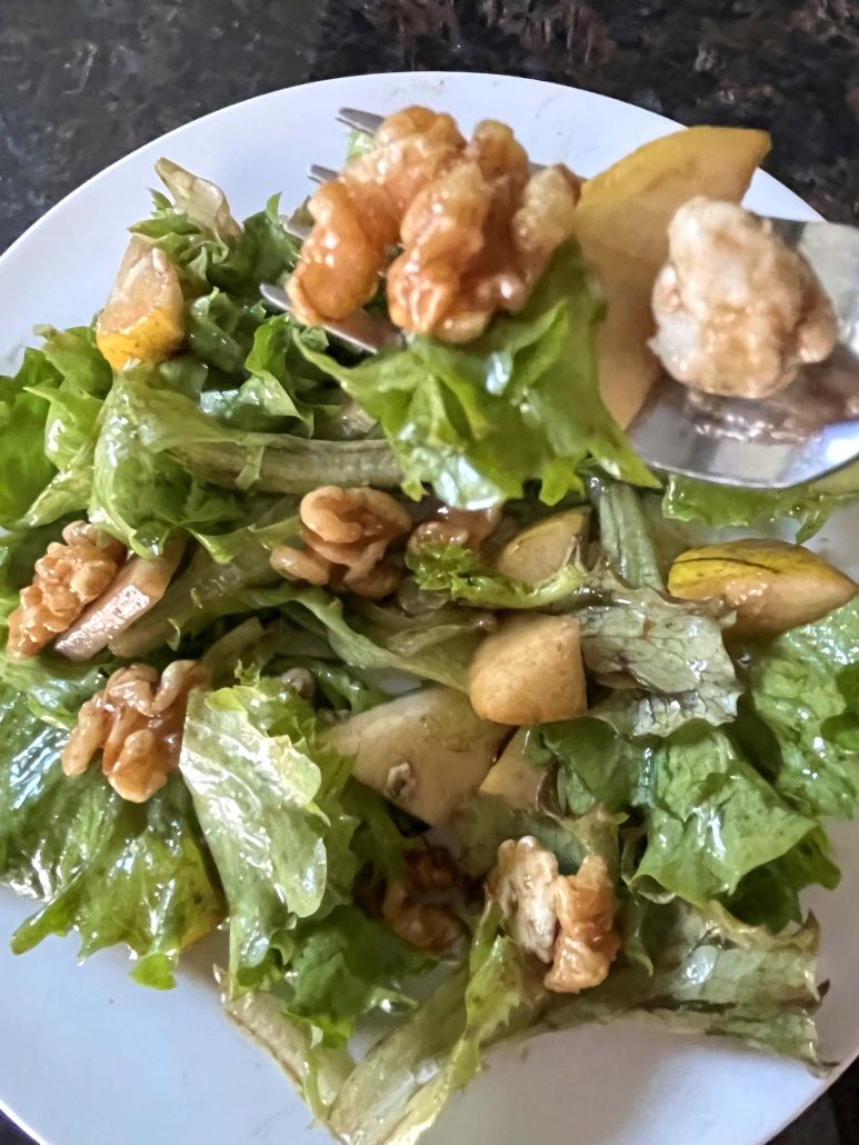 fork grabbing a bite of healthy Pear And Gorgonzola Salad