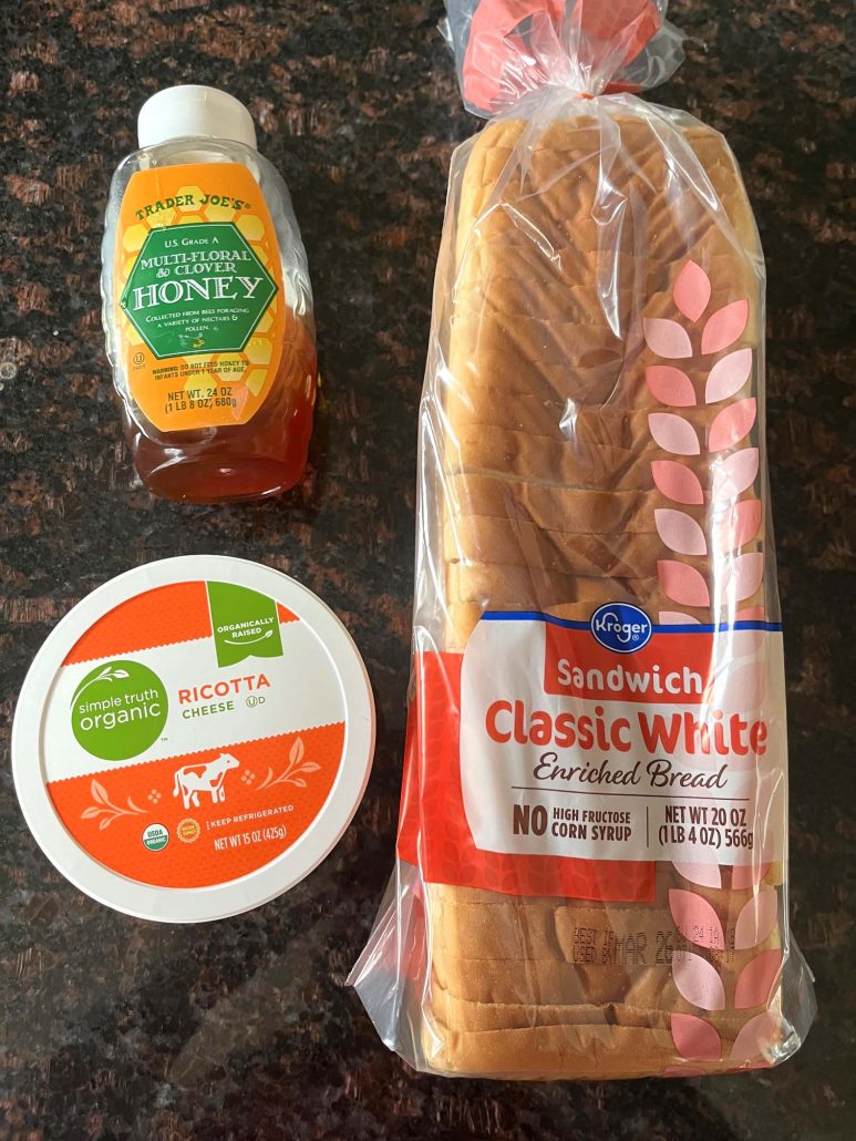 ingredients for Ricotta Toast: bread, ricotta cheese, and honey