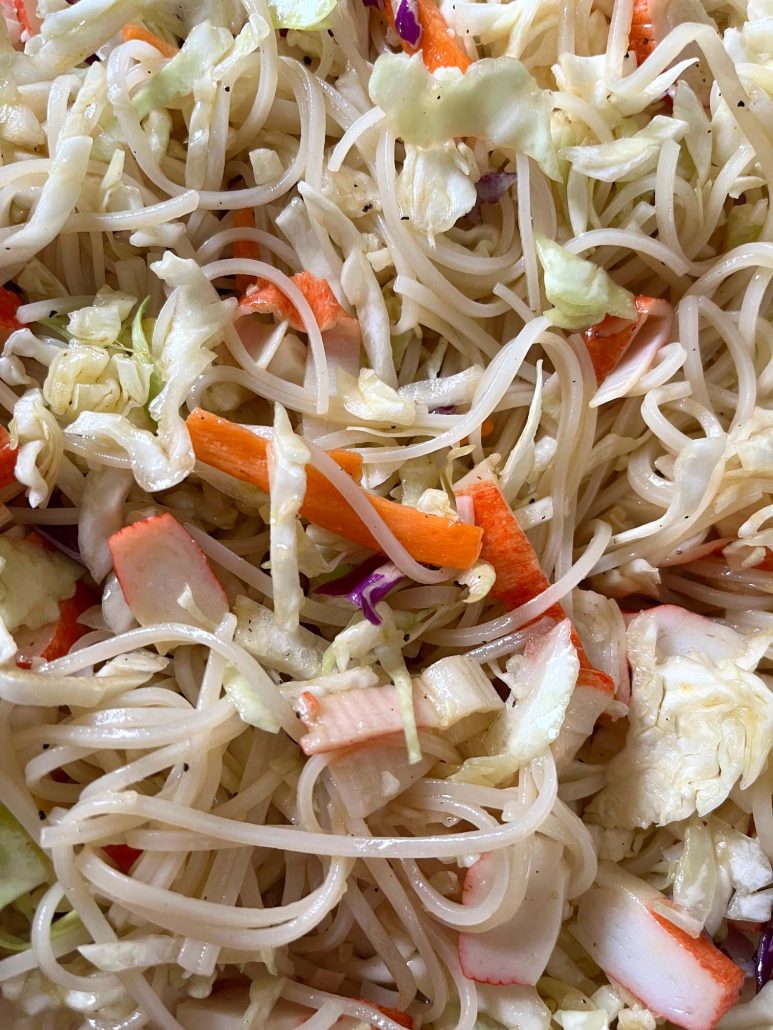 Spring Roll In A Bowl topped with an olive oil, soy sauce, and rice vinegar dressing