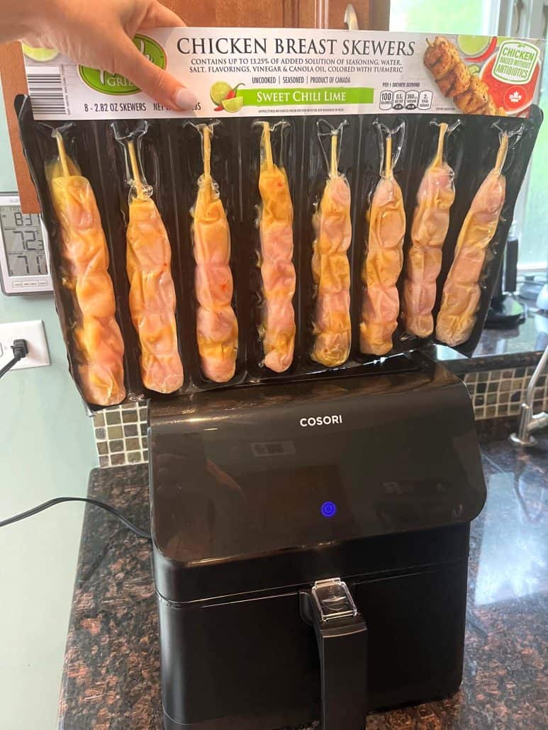 One pack of Aldi chicken breast skewers and an air fryer.