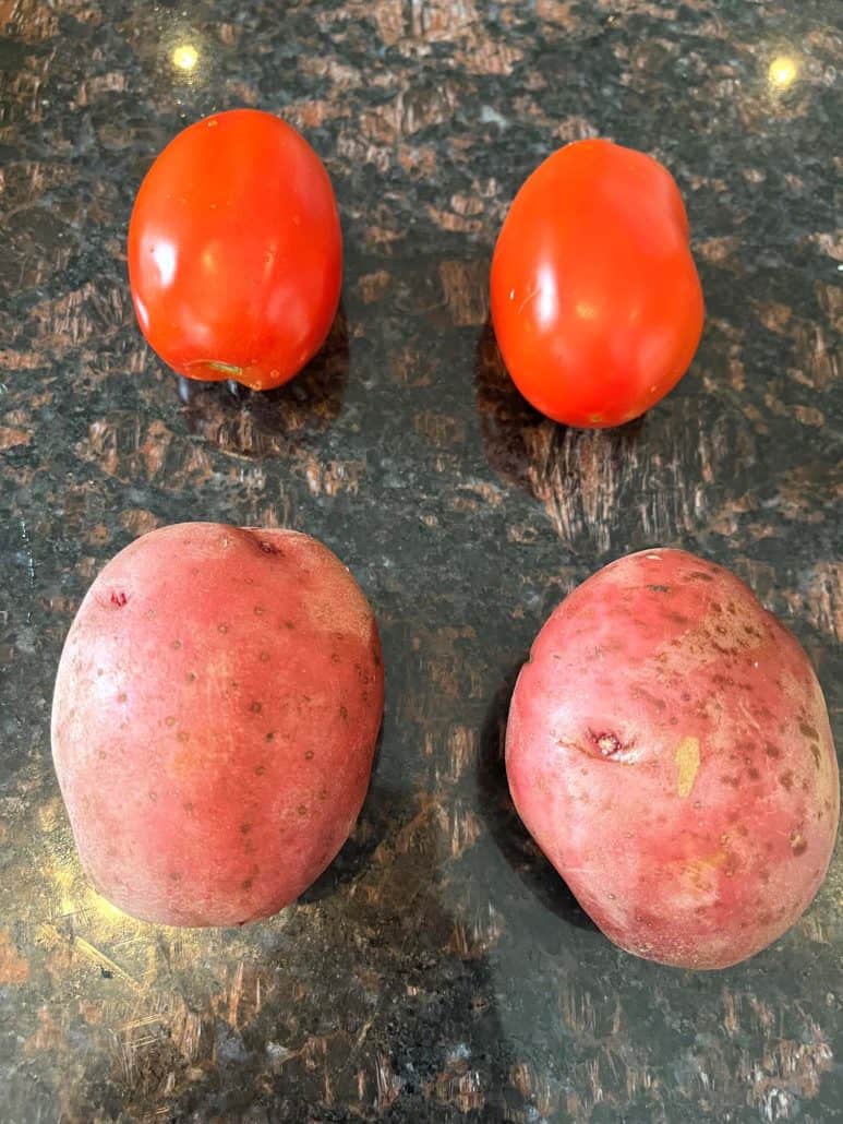 2-ingredients for fried potatoes and tomatoes.