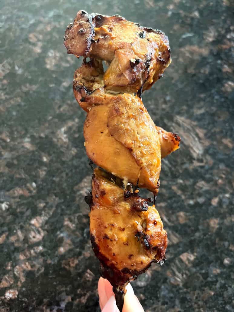 One piece of air fryer chicken teriyaki skewers.