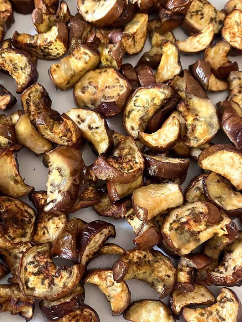 Close-up of golden, crispy air-fried Chinese eggplant chunks, highlighting their delicious texture and perfect seasoning.