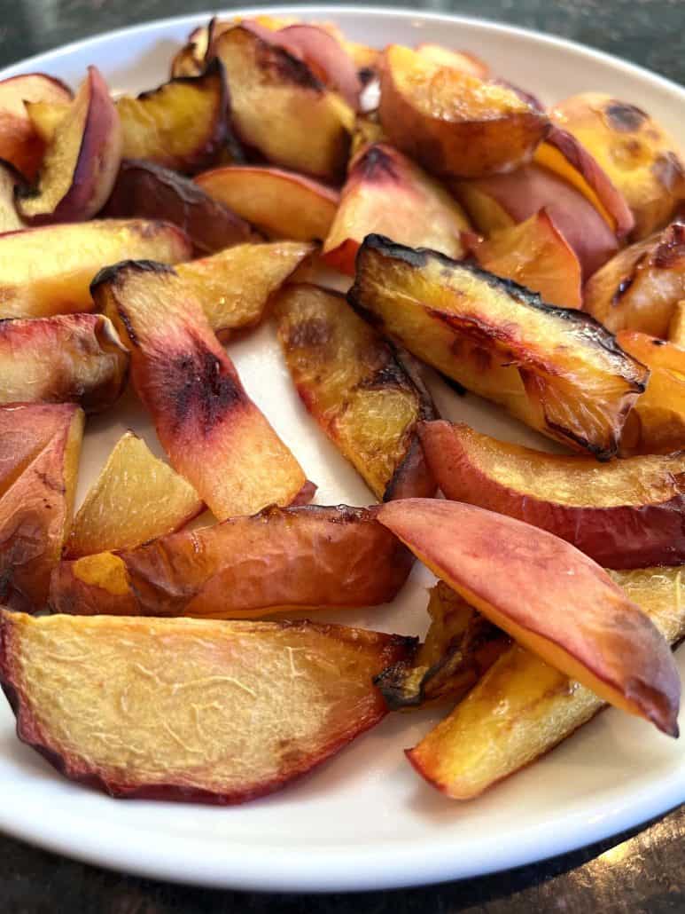 Perfectly golden-brown roasted peach slices. Naturally sweet and healthy. 