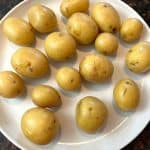 Freshly boiled small potatoes, ready to be served.