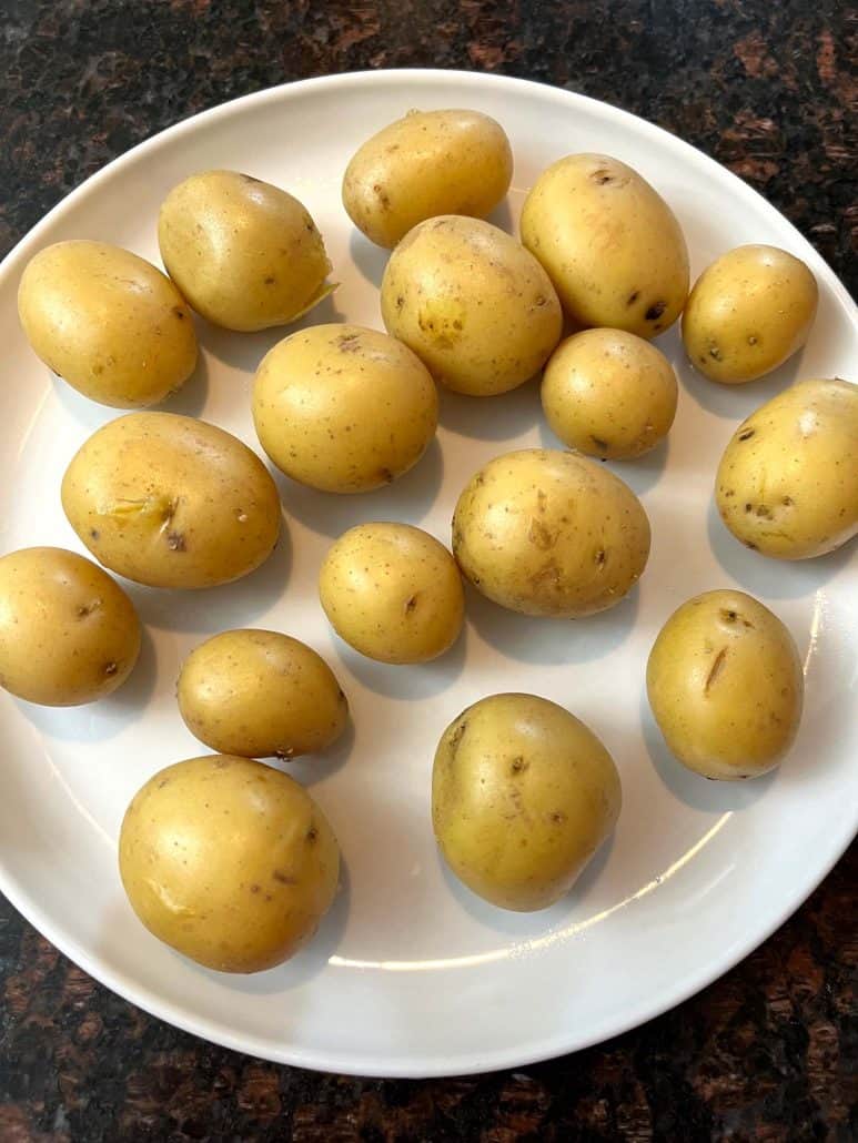 Freshly boiled small potatoes, ready to be served.