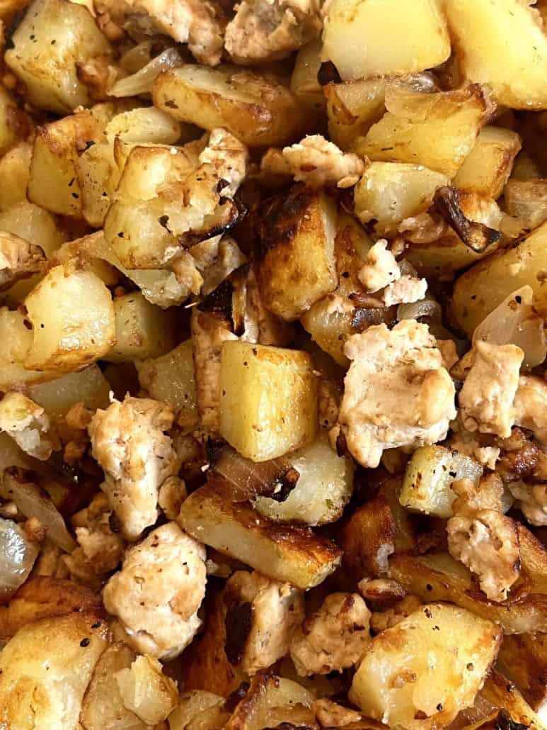 Close-up of Ground Turkey and Potatoes dish. Highlighting the well-cooked ground turkey and golden-brown potatoes.