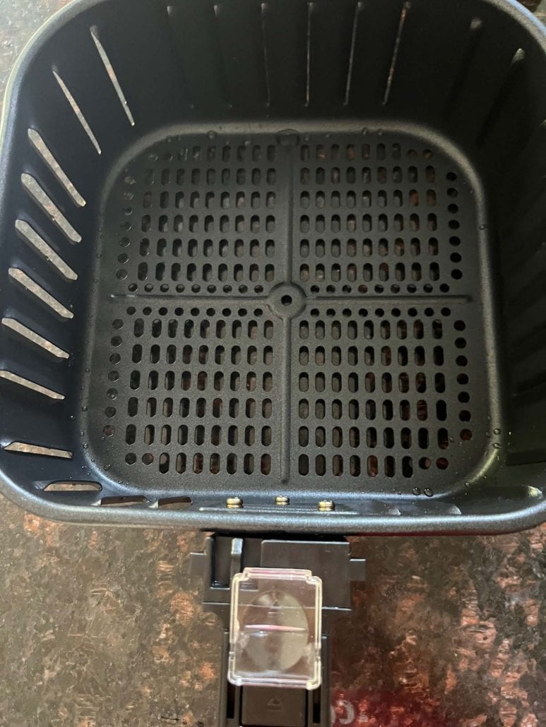 Top view of cleaned air fryer basket.