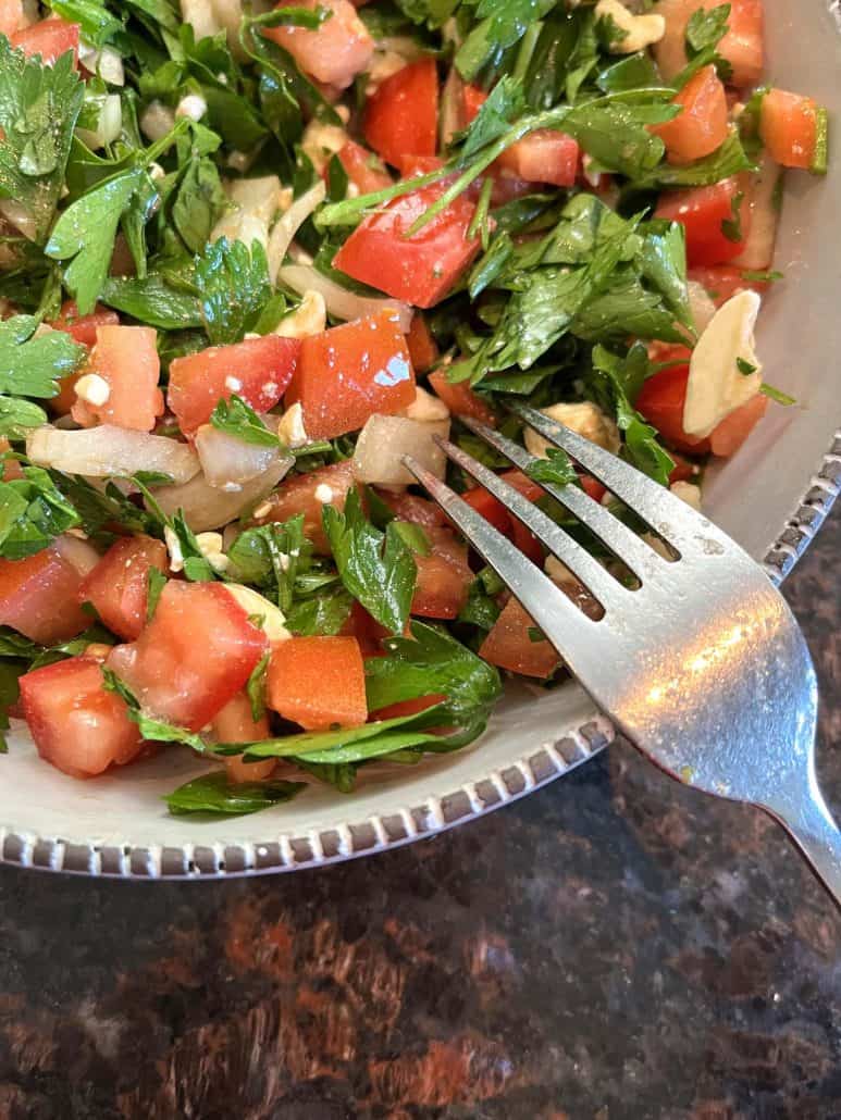 Fork resting on the side, showcasing the healthy fresh ingredients.