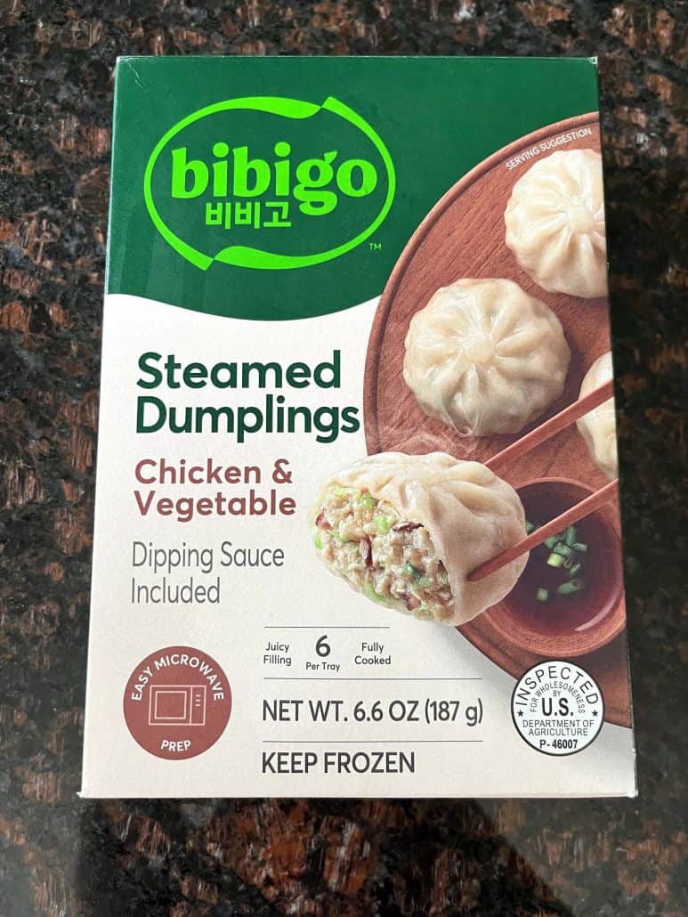 Package of Bibigo Steamed Dumplings with chicken and vegetable filling.