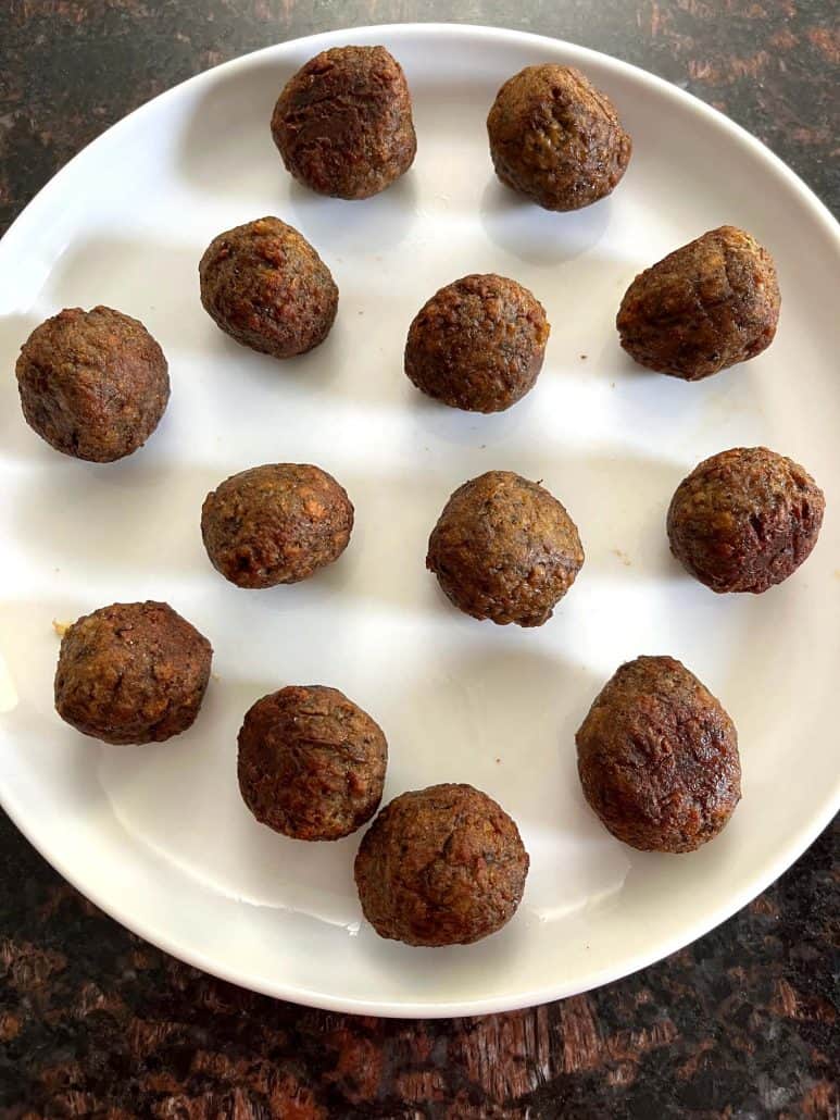 Air-fried Impossible Meatballs served on a white plate, ready-to-eat vegan option.