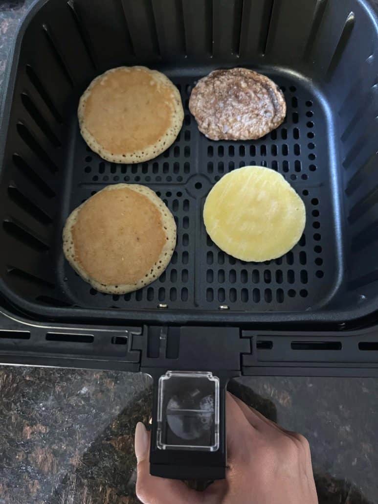 Jimmy Dean Maple Griddle Cake sandwich, including pancakes, sausage patty, and egg, before cooking.