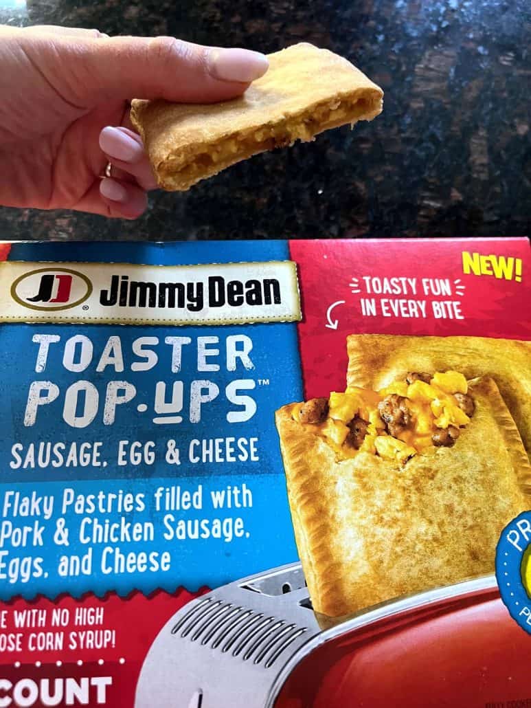 Top view of a Jimmy Dean Toaster Pop Ups package next to a partially eaten, crispy toaster pop up.