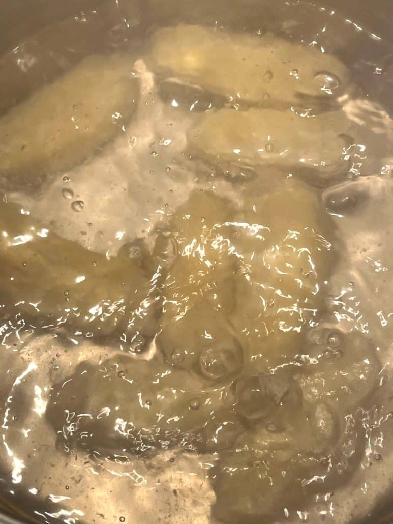 Bubbles forming as the Saba bananas cook to tenderness.