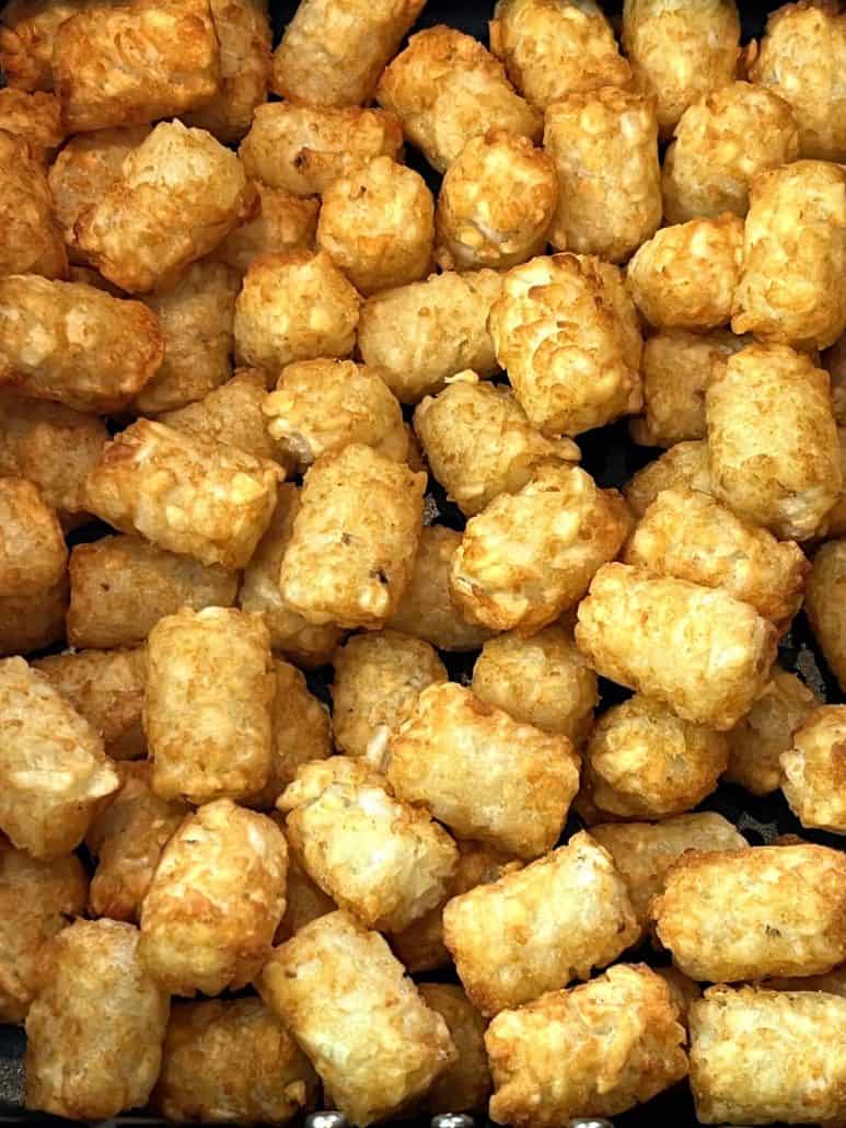 Perfectly golden and crispy Sonic tater tots, highlighting their crunchy texture.