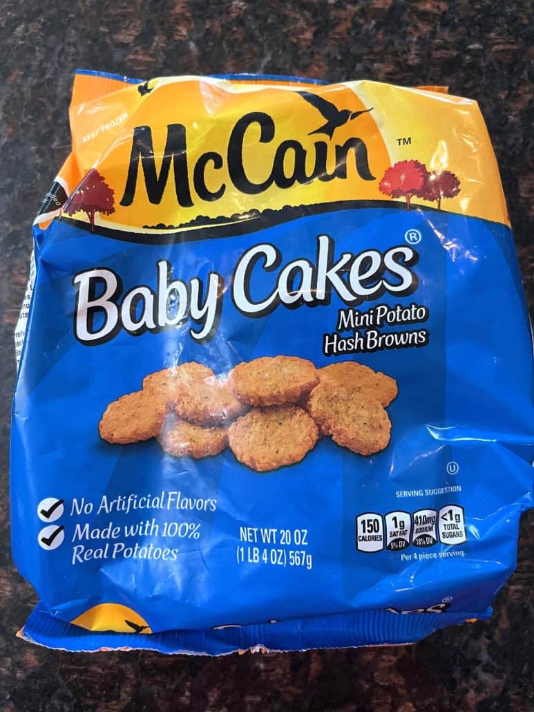 Package of McCain Baby Cakes Hashbrowns displayed, ready to be cooked.