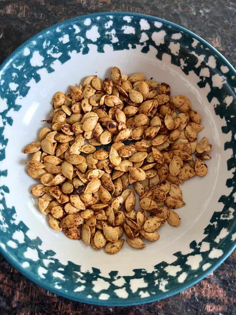 Ready to serve, roasted pumpkin seeds in a bowl.