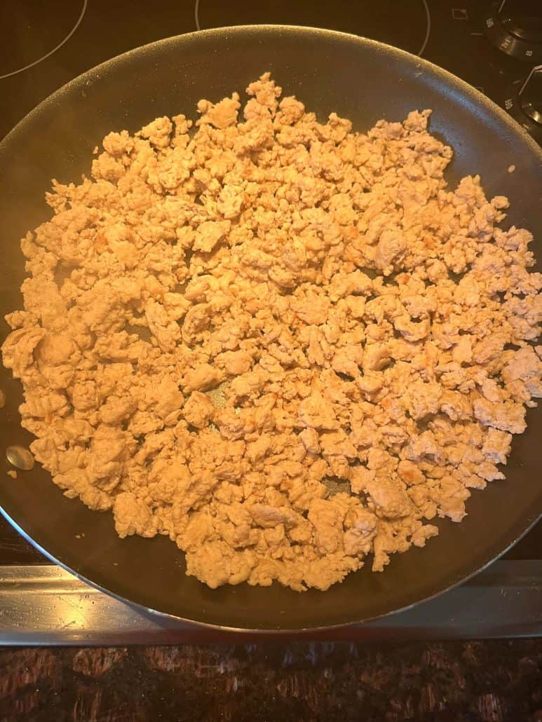  Fully cooked ground chicken with a golden-brown finish.