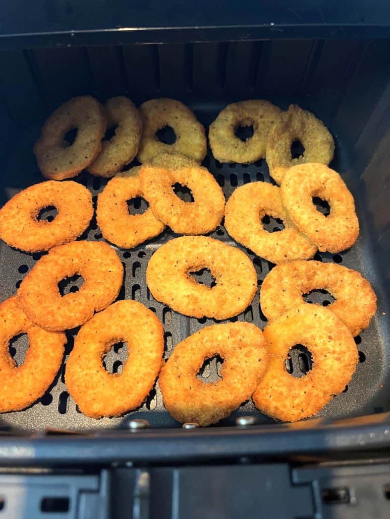 Freshly air-fried White Castle chicken rings in a basket.