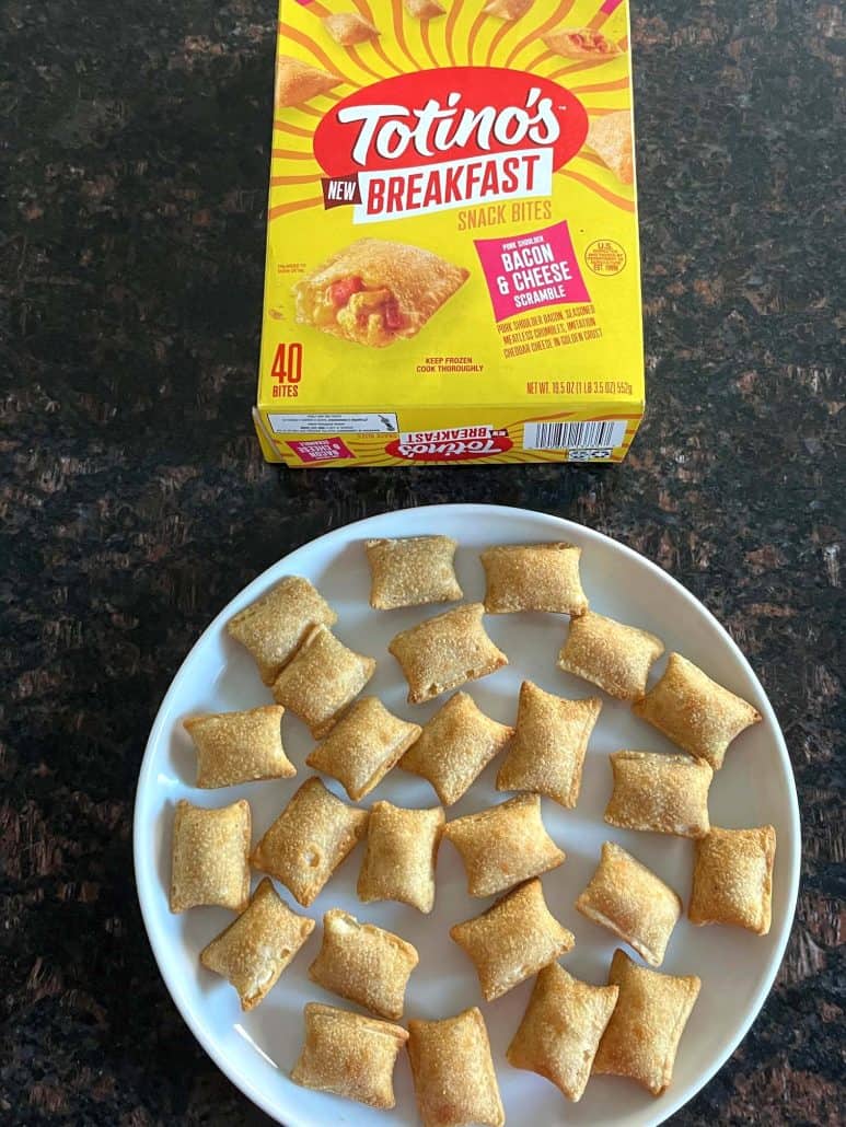 Plate of crispy Totino's Breakfast Snack Bites served fresh, with the product box displayed in the background for reference.