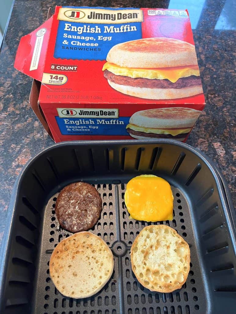 Jimmy Dean English Muffin Sandwich separated into individual components, inside an air fryer basket.