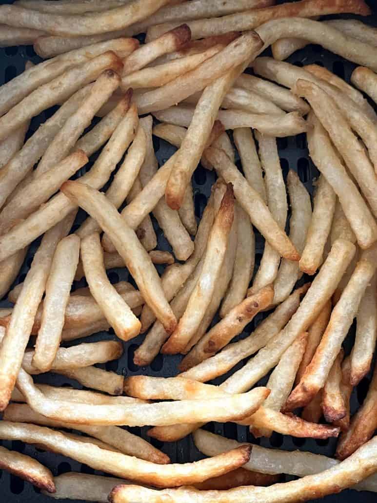 Close-up of crispy McCain Beer Battered Fries cooked in the air fryer, highlighting their golden brown texture.