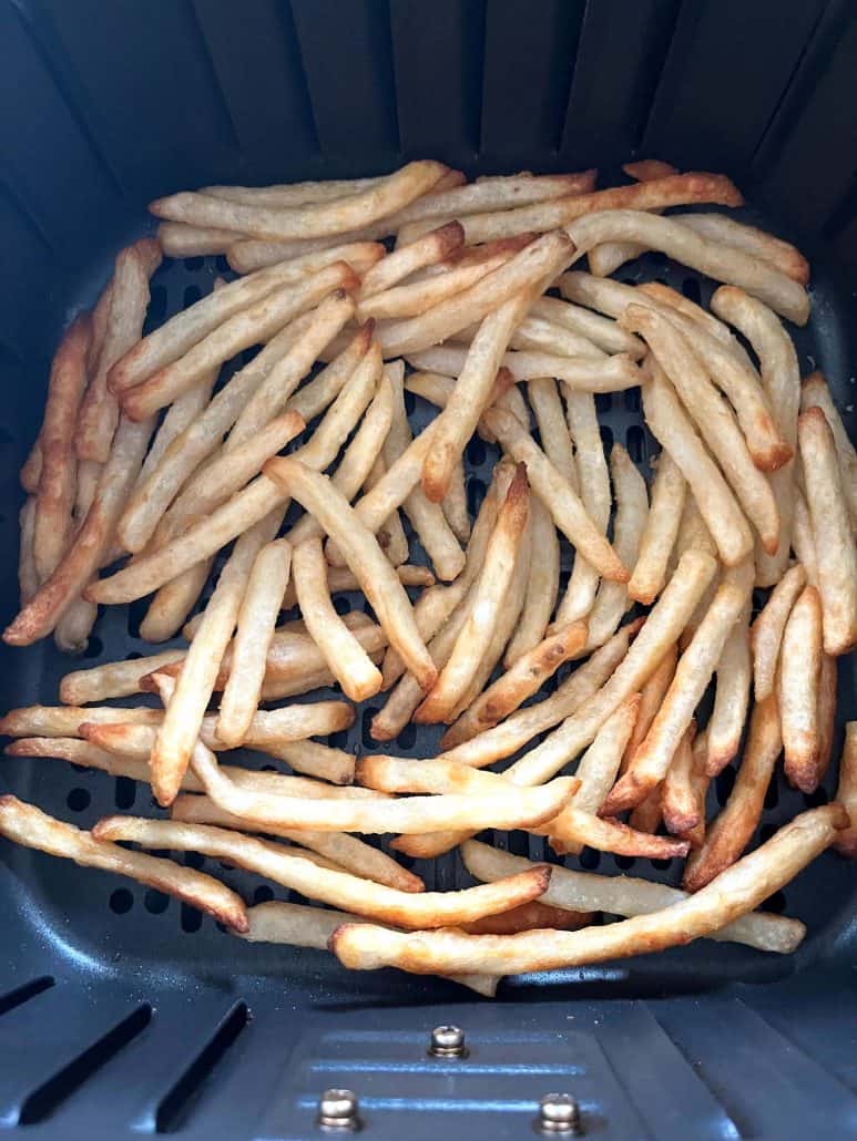 Golden brown McCain Beer Battered Fries cooked to crispy perfection in the air fryer basket.
